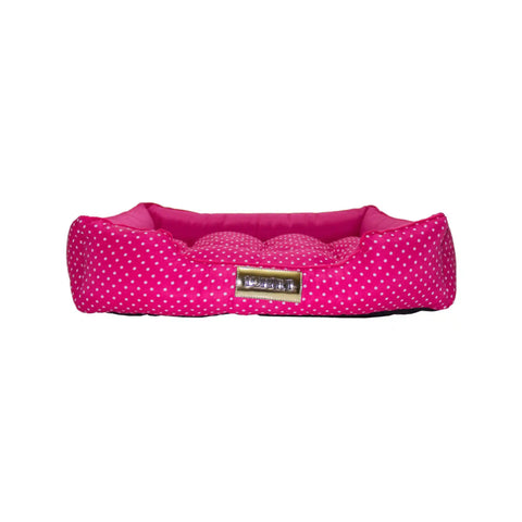 Cama para cachorros e gatos com design fofo em rosa com bolinhas. Macia e ideal para pets tranquilos. Compre já!