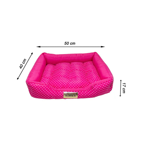 Cama para cachorros e gatos com design fofo em rosa com bolinhas. Macia e ideal para pets tranquilos. Compre já!